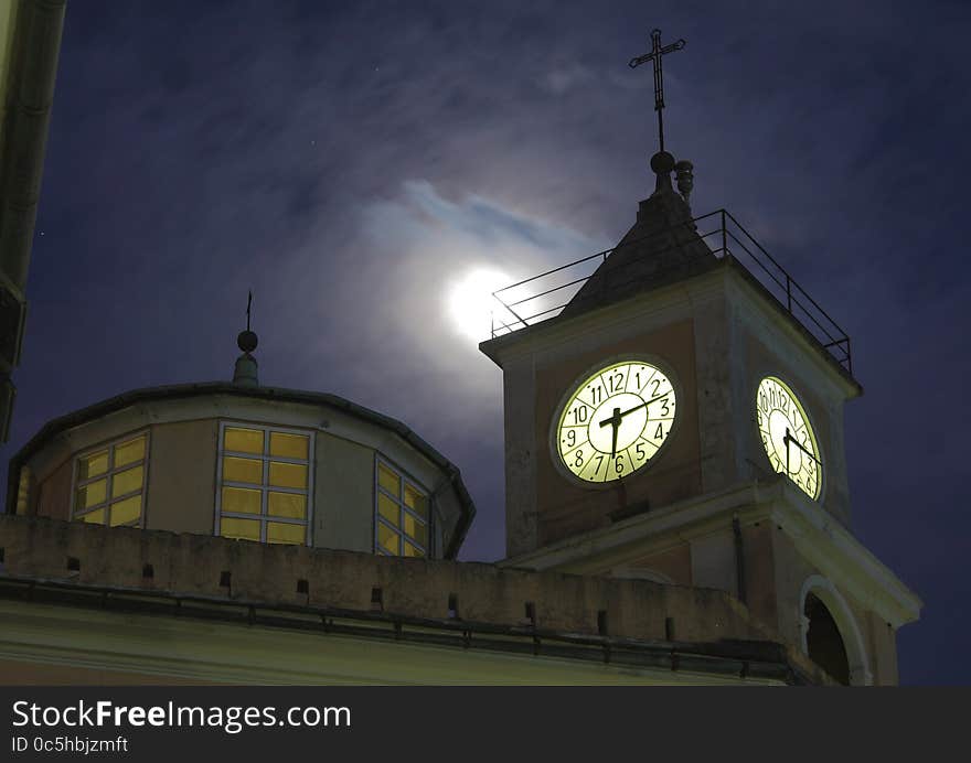 The bell tower , the moon and the night