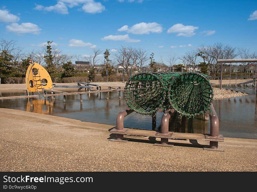 A blue sky children playground equipment.