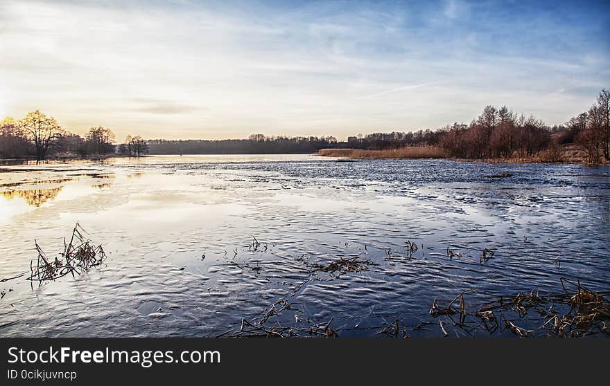 Winter lake at sunset