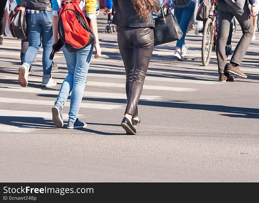 Pedestrians walking on a crosswalk