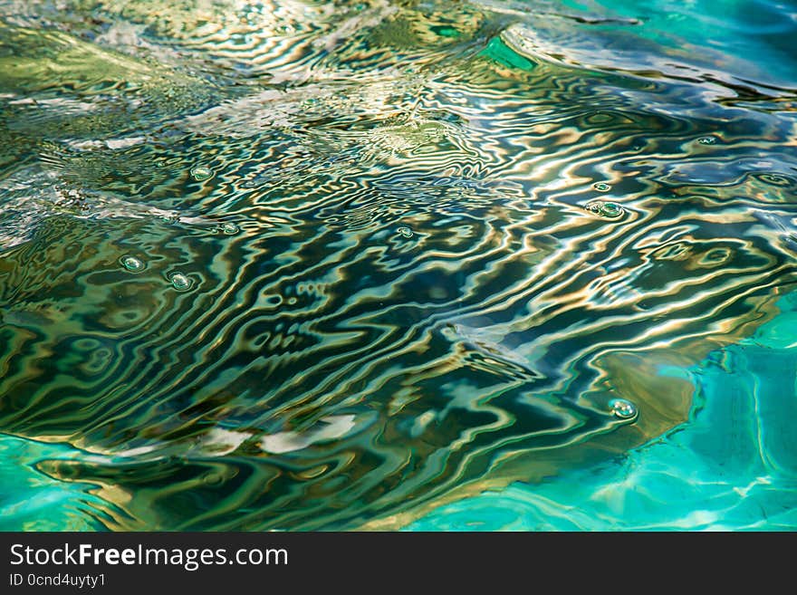 Abstract bright multicoroled reflection in water. Abstract bright multicoroled reflection in water