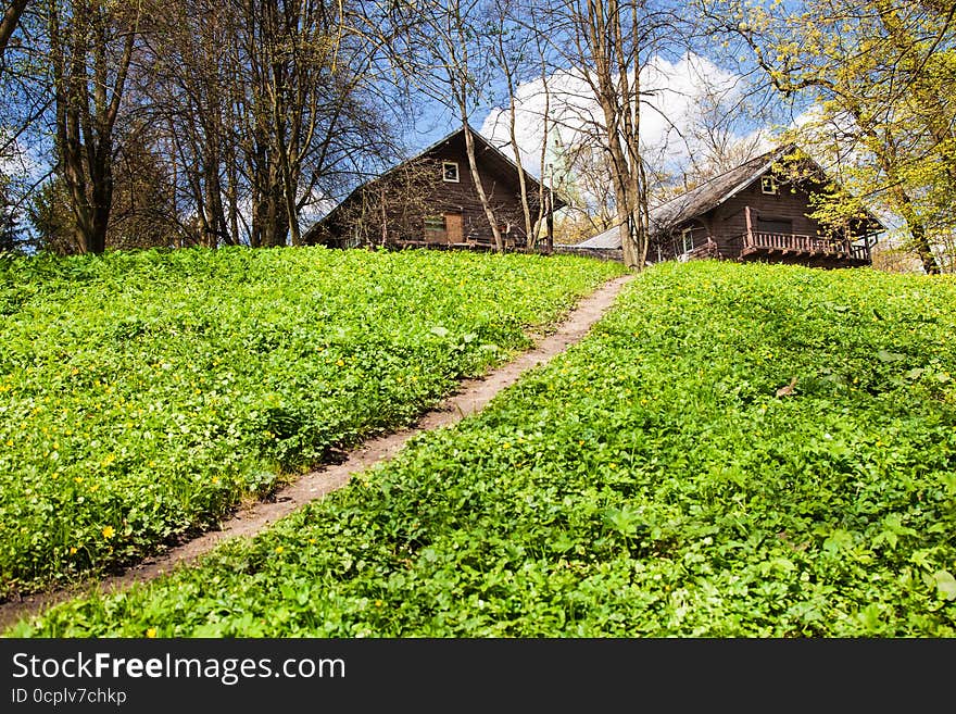 Two wooden houses on the hill