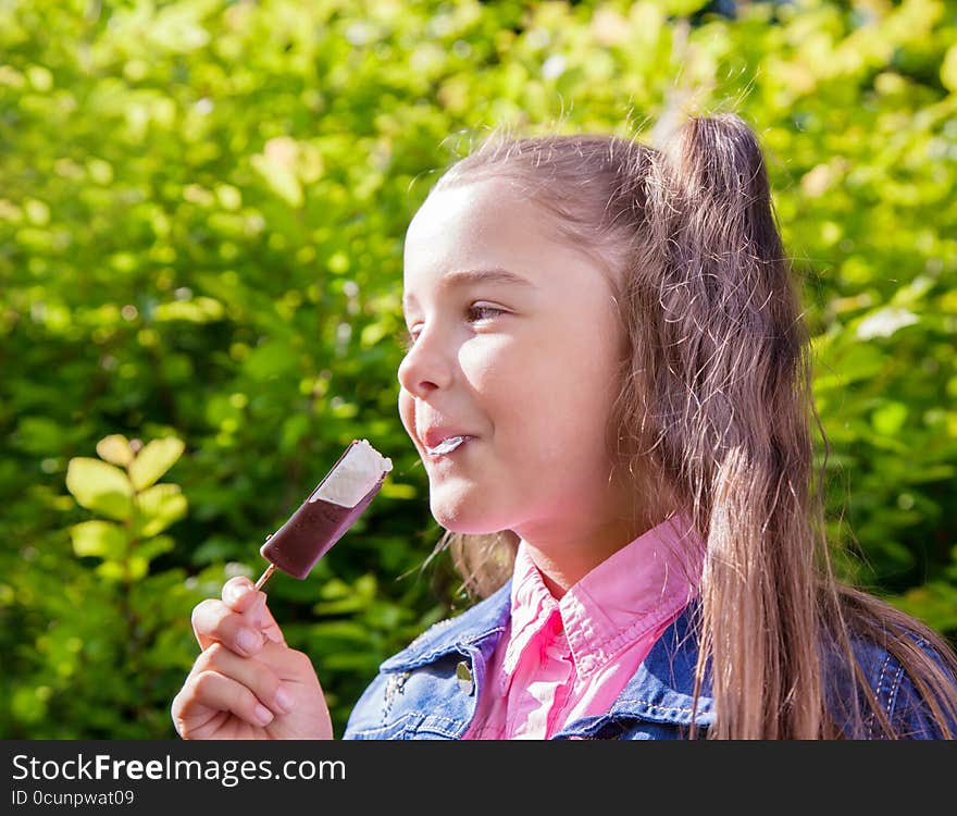 Girl eating ice cream outside