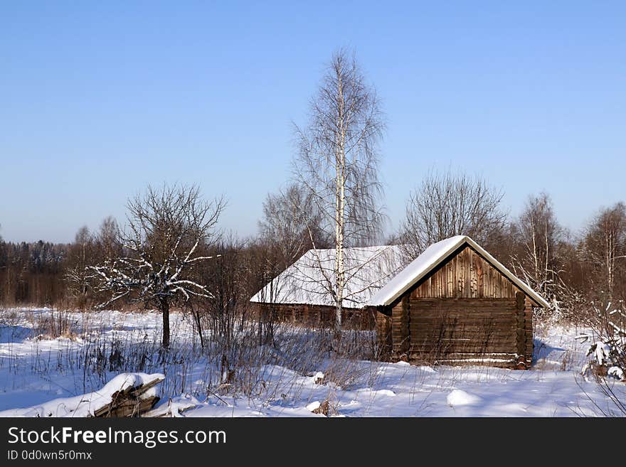 House in a village in a winter day