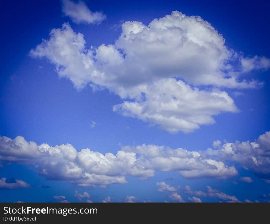 Conceptual picture with sky vision in your dream with fluffy white clouds in a hot summer day