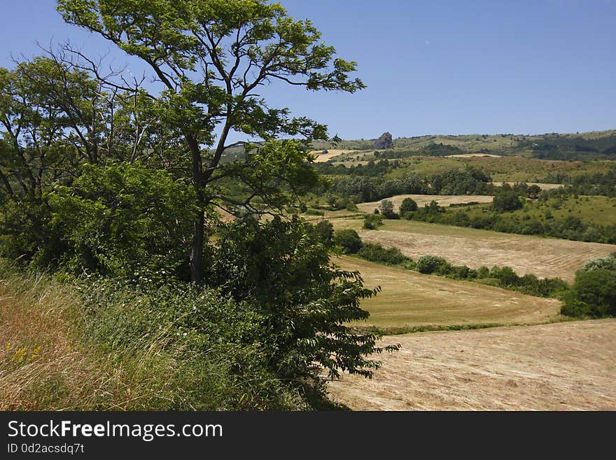 A view of harvested field. Italian Appennines. A view of harvested field. Italian Appennines.