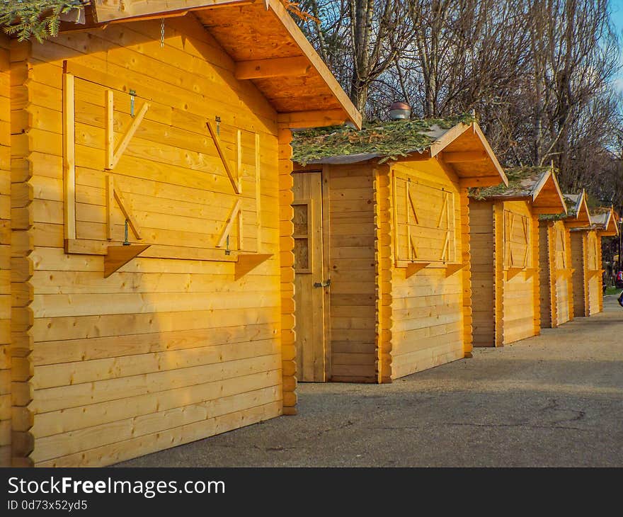 Rustic wooden market building in park