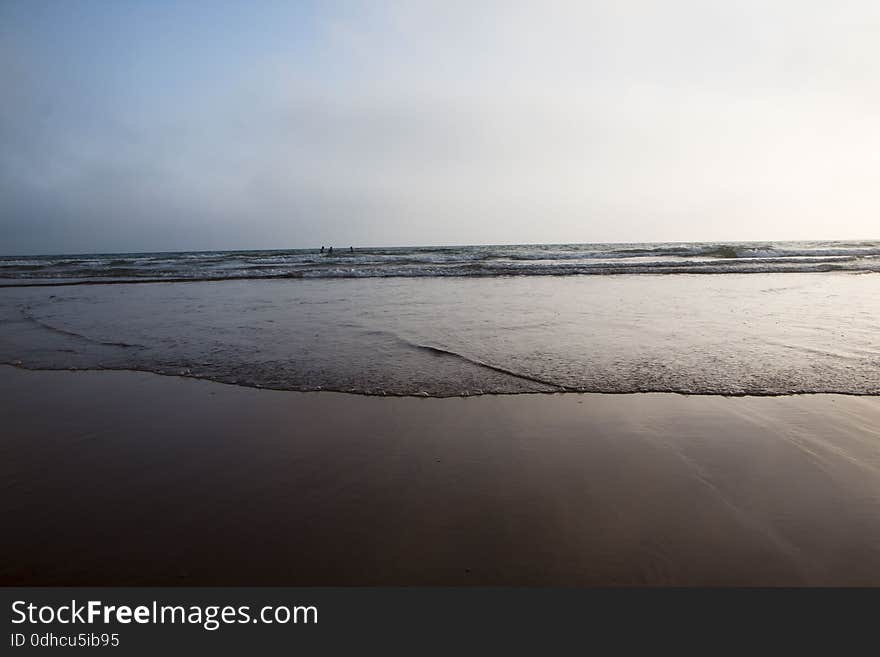 Beach, coast and wave in a summer day