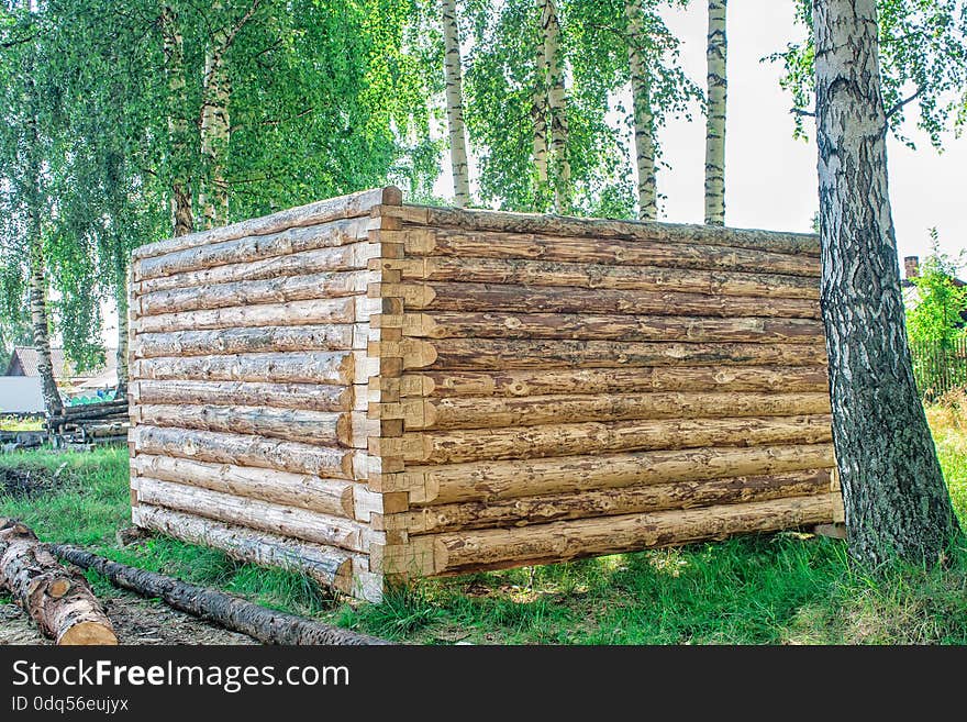 Construction of a new wooden house, log cabin on summer. Construction of a new wooden house, log cabin on summer