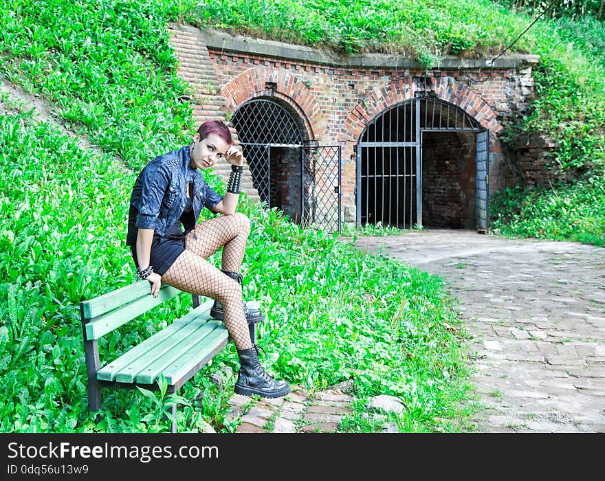 Punk Girl Sitting On The Bench