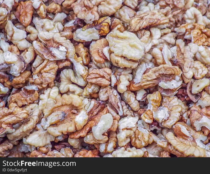 Delicious walnuts background in market