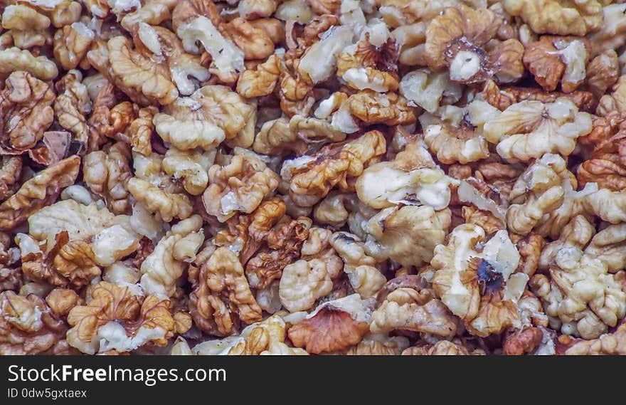 Delicious walnuts background in market