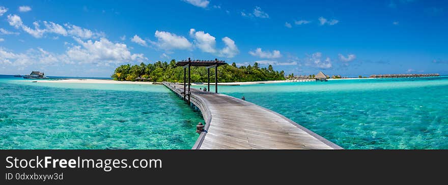 Amazing beautiful tropical island panorama with bridge at Maldives. Amazing beautiful tropical island panorama with bridge at Maldives