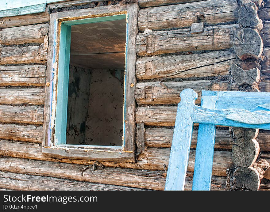 Repair of wooden house on sunny summer day. Repair of wooden house on sunny summer day