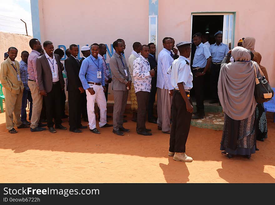 Delegates queue up during the electoral process to choose members of the Lower House of the of the Federal parliament in Cadaado, Somalia on November 28, 2016. AMISOM Photo. Delegates queue up during the electoral process to choose members of the Lower House of the of the Federal parliament in Cadaado, Somalia on November 28, 2016. AMISOM Photo