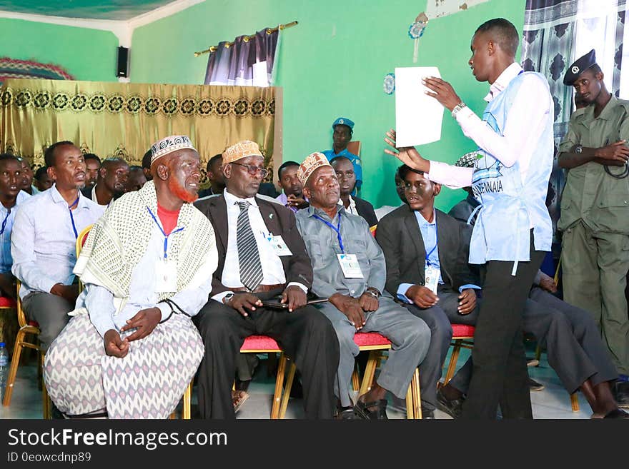 Electoral official briefs delegates during the electoral process to choose members of the Lower House of the Federal Parliament in Cadaado, Somalia on November 28, 2016. AMISOM Photo. Electoral official briefs delegates during the electoral process to choose members of the Lower House of the Federal Parliament in Cadaado, Somalia on November 28, 2016. AMISOM Photo