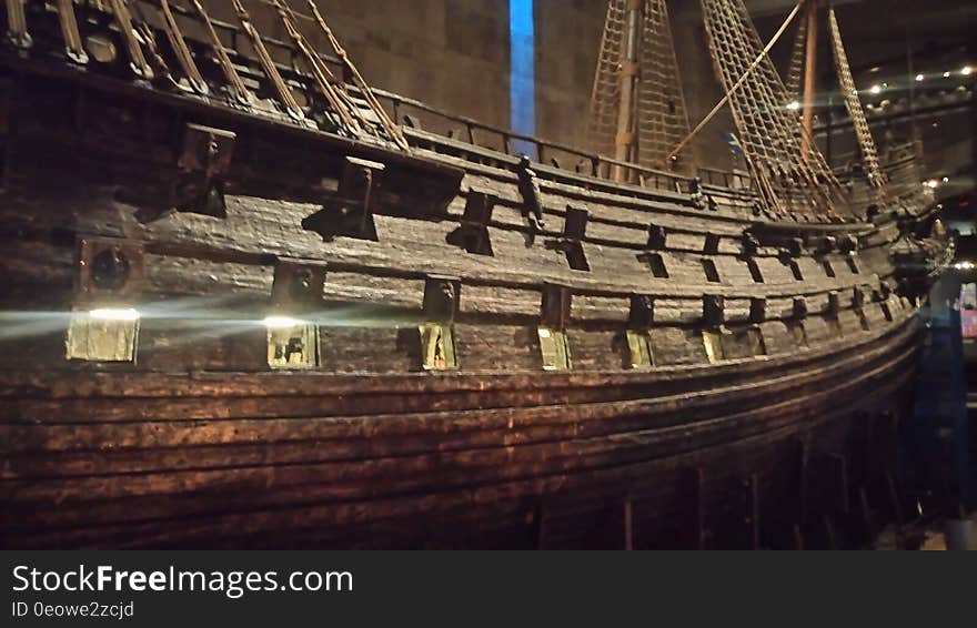 Wooden antique ship inside museum. Wooden antique ship inside museum.