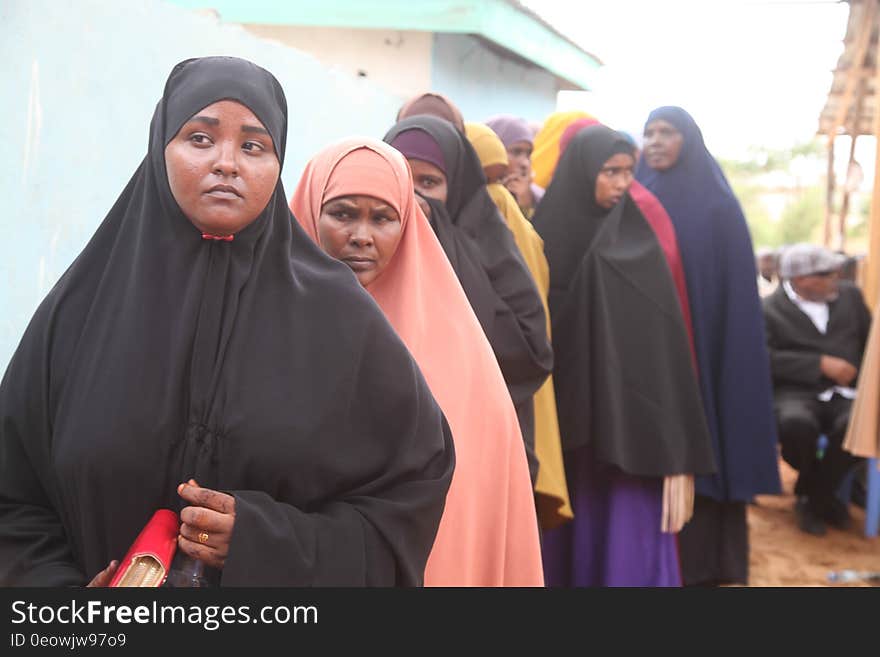 Delegates queue up during the electoral process to choose members of the Lower House of the Somali federal Parliament in Kismaayo, Somalia on November 23, 2016. UN Photo/ Barut. Delegates queue up during the electoral process to choose members of the Lower House of the Somali federal Parliament in Kismaayo, Somalia on November 23, 2016. UN Photo/ Barut