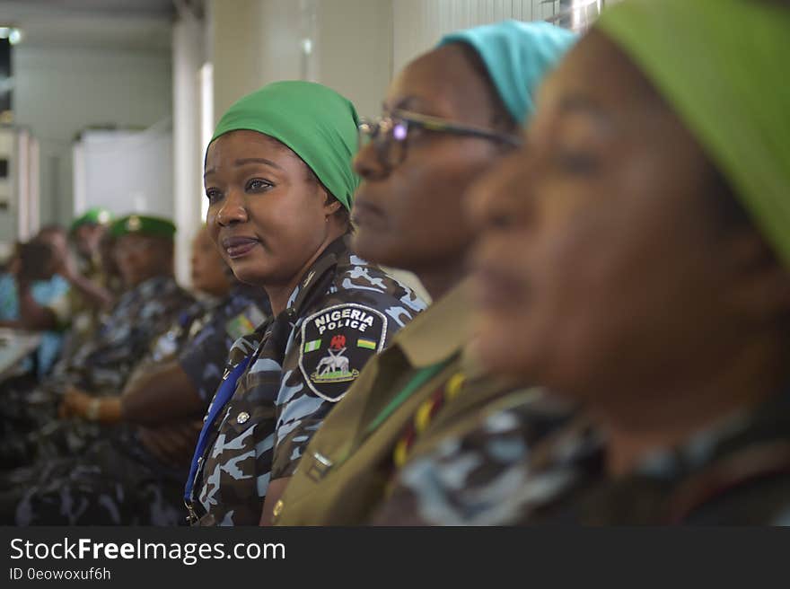 Police women clap during a ceremony in Mogadishu, Somalia, to mark the rotation of Ghanian police officers out of the African Union Mission to Somalia and back to their home country on December 11, 2016. AMISOM Photo / Tobin Jones. Police women clap during a ceremony in Mogadishu, Somalia, to mark the rotation of Ghanian police officers out of the African Union Mission to Somalia and back to their home country on December 11, 2016. AMISOM Photo / Tobin Jones