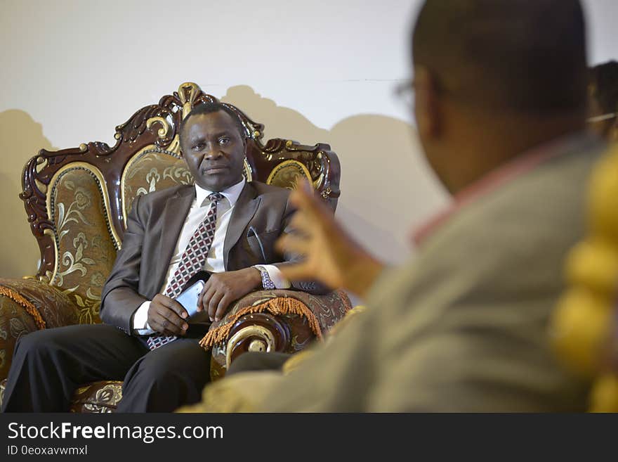 AMISOM Senior Political Affairs Officer, Haji Ssebirumbi Kisinziggo, speaks with Deputy Chairman of Somalia&#x27;s National Independent Electoral Commission, Sayid Ali Sh. Mohamed, after his return from Ghana to Mogadishu on December 11, 2016. AMISOM Photo / Tobin Jones. AMISOM Senior Political Affairs Officer, Haji Ssebirumbi Kisinziggo, speaks with Deputy Chairman of Somalia&#x27;s National Independent Electoral Commission, Sayid Ali Sh. Mohamed, after his return from Ghana to Mogadishu on December 11, 2016. AMISOM Photo / Tobin Jones