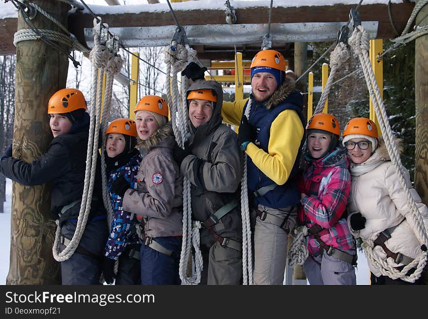 A group of people on an obstacle course. A group of people on an obstacle course.