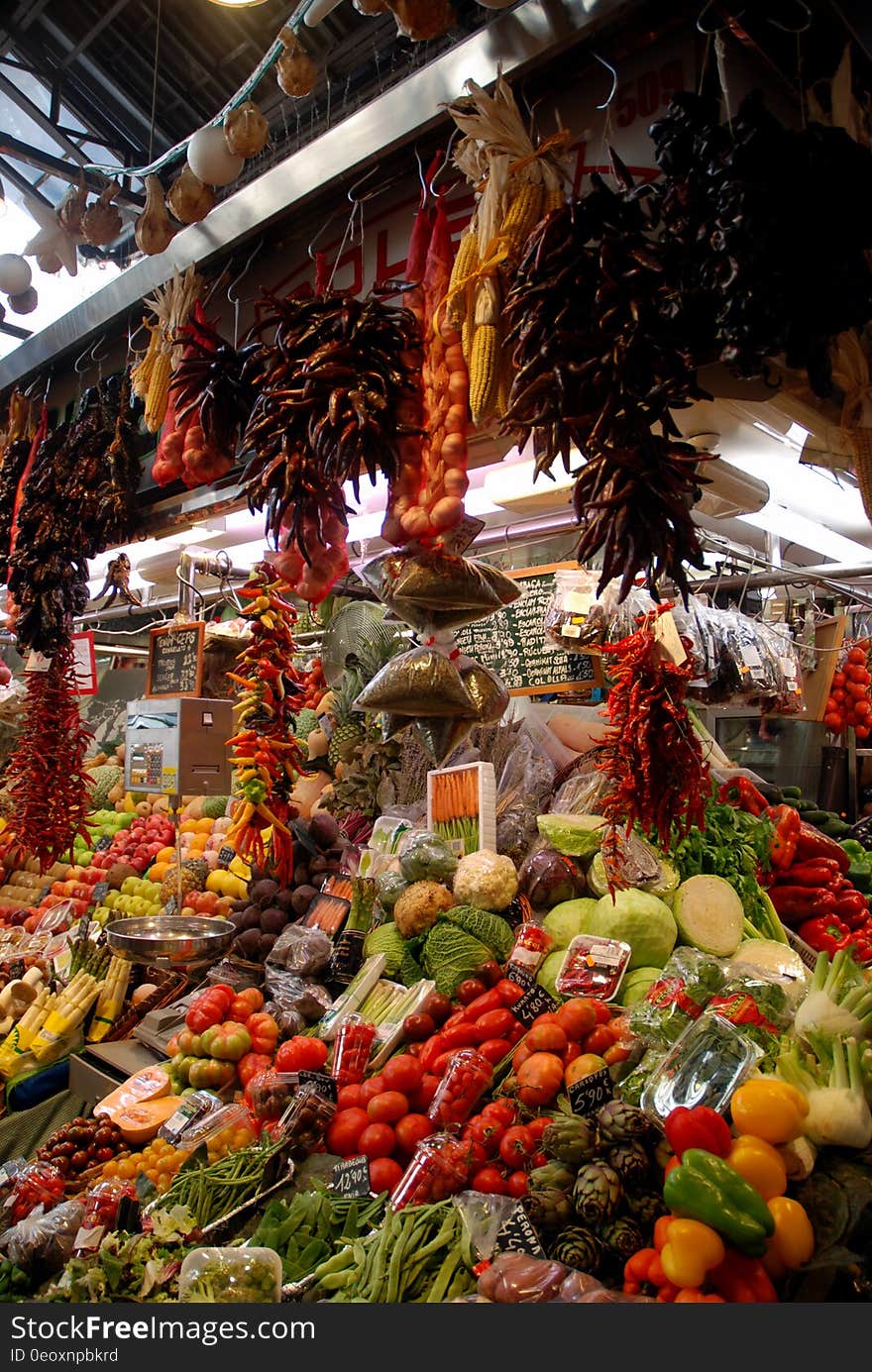 Produce stand in market with fresh fruits and vegetables in Barcelona, Spain. Produce stand in market with fresh fruits and vegetables in Barcelona, Spain.