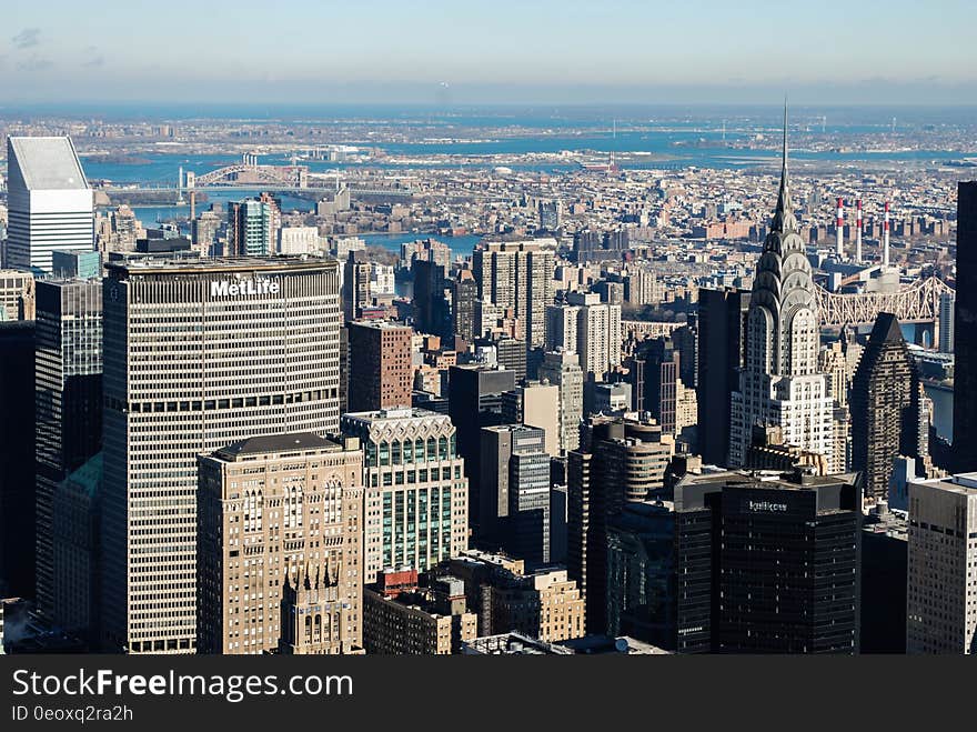 Aerial view of urban skyline with MetLife building on sunny day. Aerial view of urban skyline with MetLife building on sunny day.