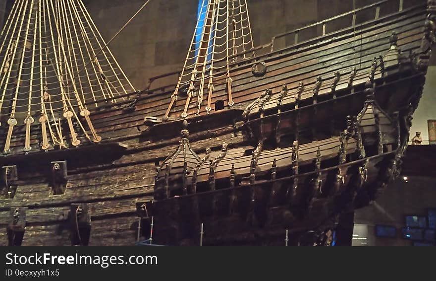 Hull and sides of wooden sailing ship inside museum. Hull and sides of wooden sailing ship inside museum.