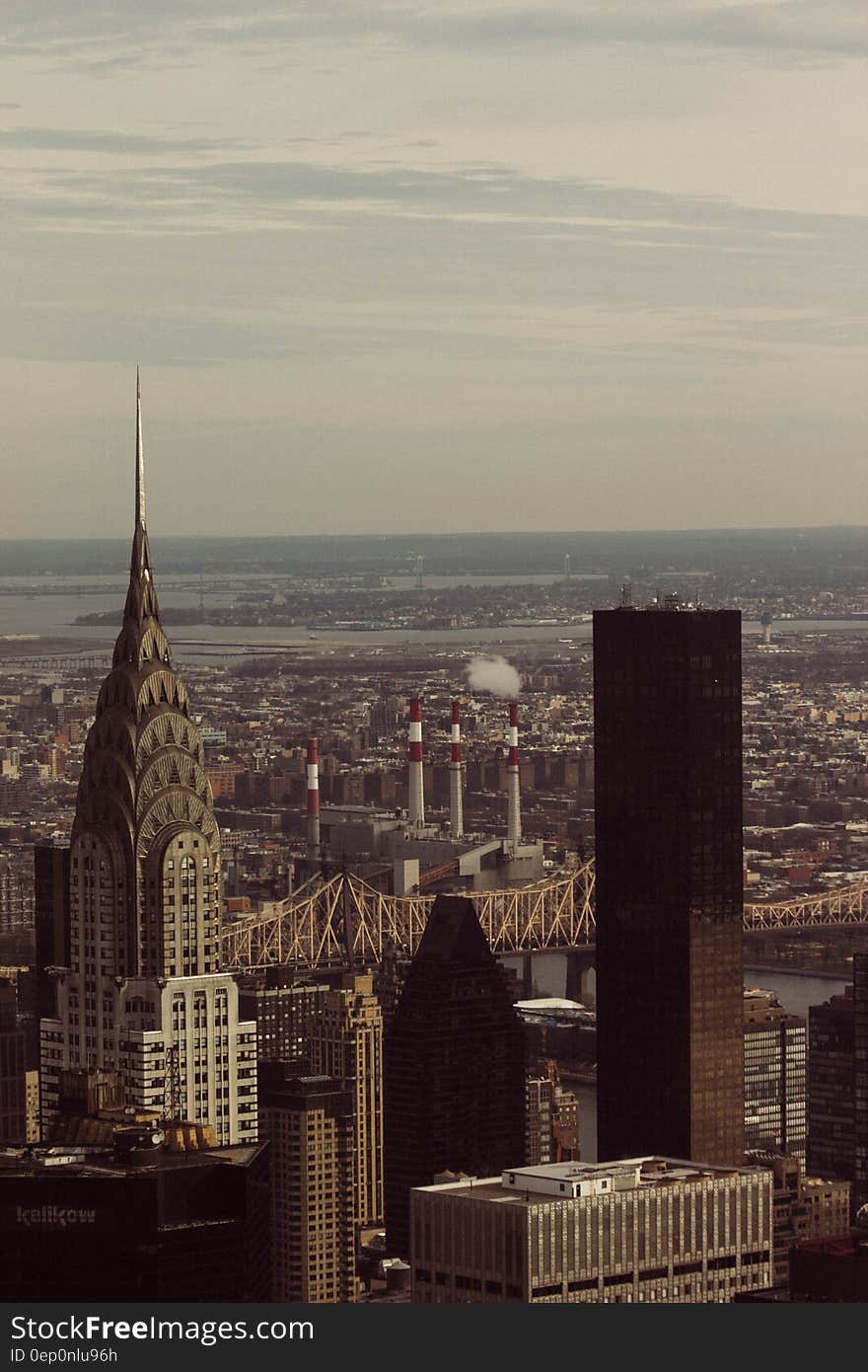 Aerial view of rooftops in modern city skyline.