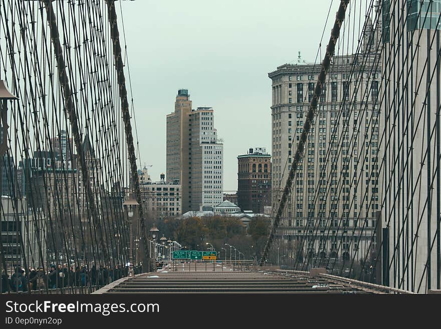 New York city skyline on Manhattan viewed from Brooklyn bridge, USA.