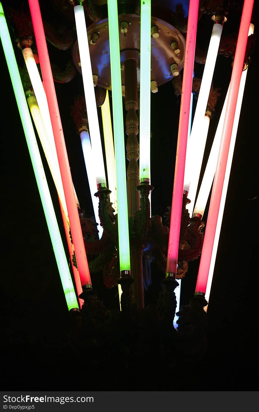 Colorful light sabers in ring.