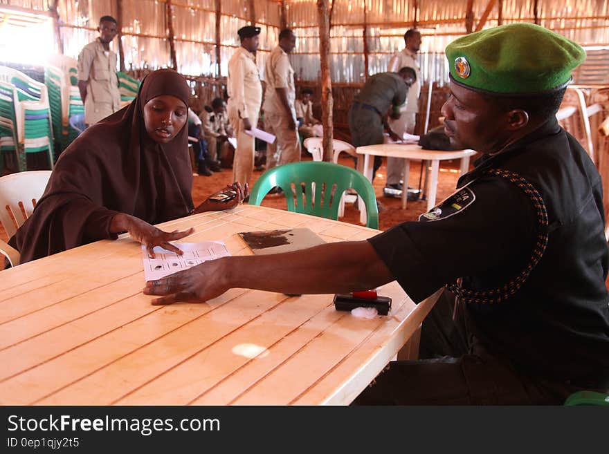 An AMISOM Police medical officer examines a recruit during the vetting exercise for the new Interim Jubbaland Administration police recruits in Kismayo Somalia on December 21, 2016. AMISOM Photo/ Barut Mohamed. An AMISOM Police medical officer examines a recruit during the vetting exercise for the new Interim Jubbaland Administration police recruits in Kismayo Somalia on December 21, 2016. AMISOM Photo/ Barut Mohamed