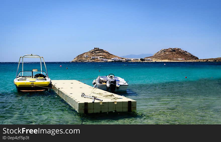 White Pedal Boat on Sea during Daytime