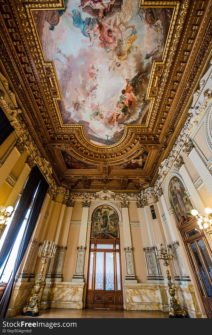 Blue Pink White and Brown Painted Ceiling Inside Establishments