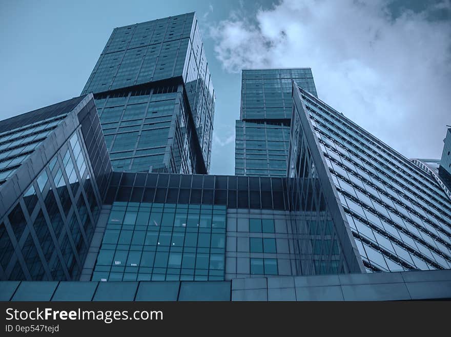 Worms Eye View Photography of Gray and Black Concrete Building