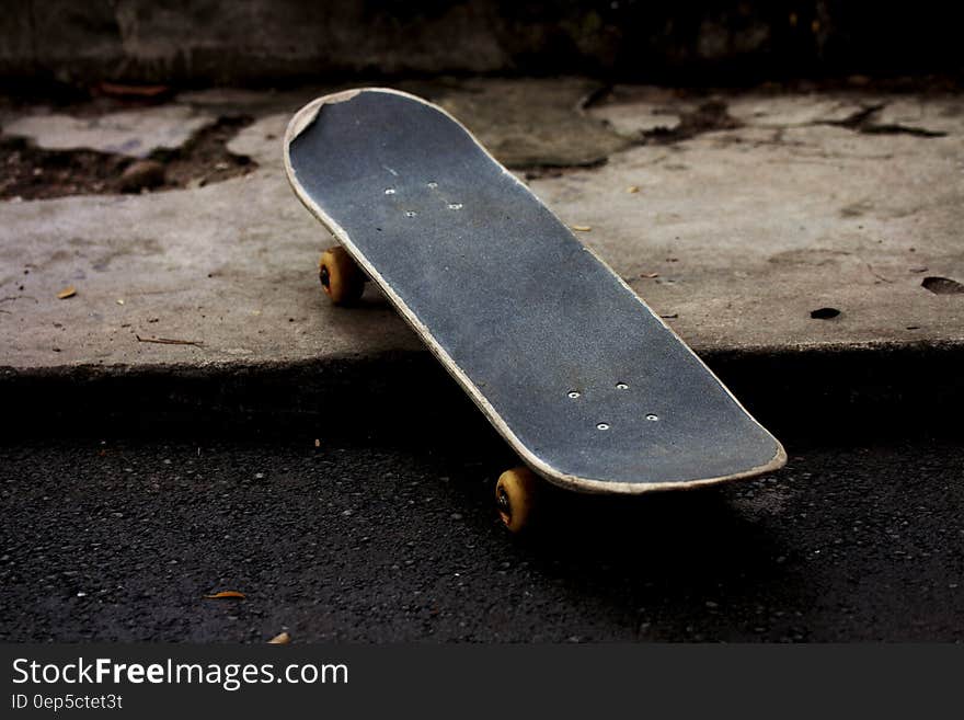 Gray and Black Skateboard