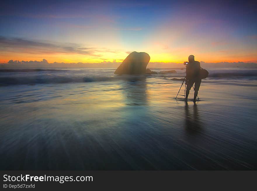 Silhouette Photography of Person on Seashore