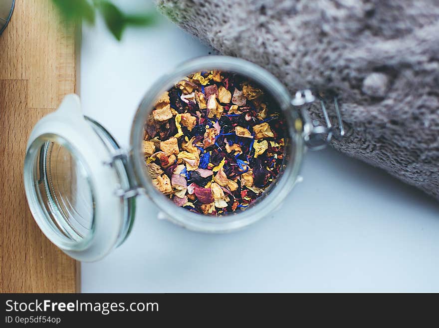 A tea mixture of different flavors in a jar. A tea mixture of different flavors in a jar.