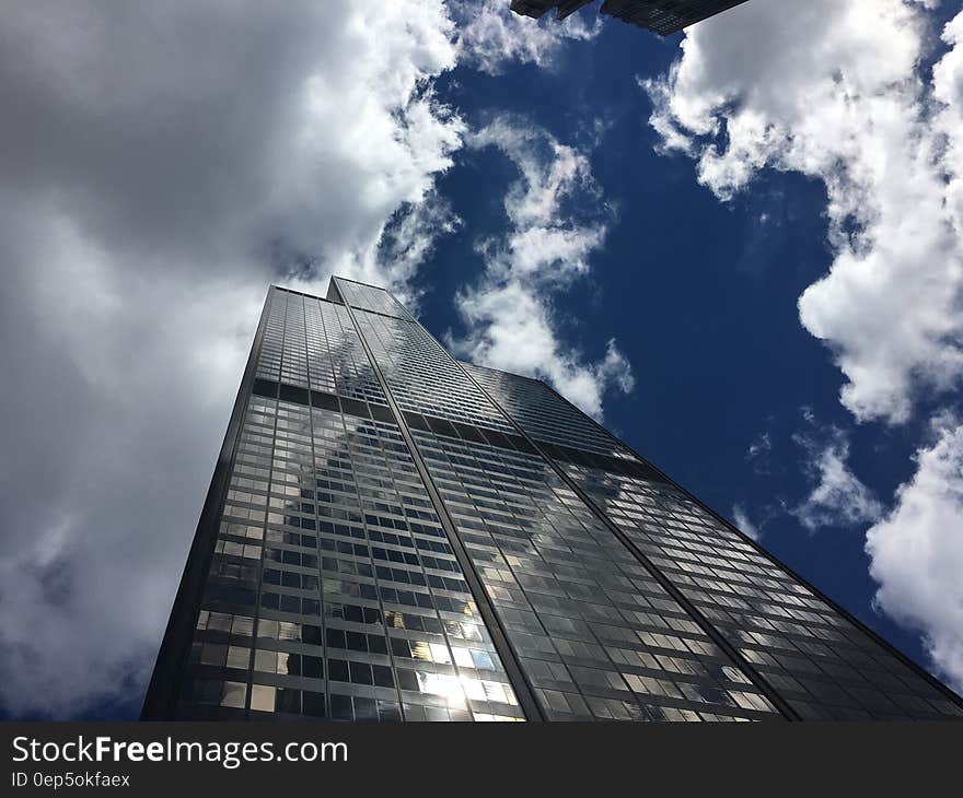 Low Angle Photography of Building Under Blue Sky