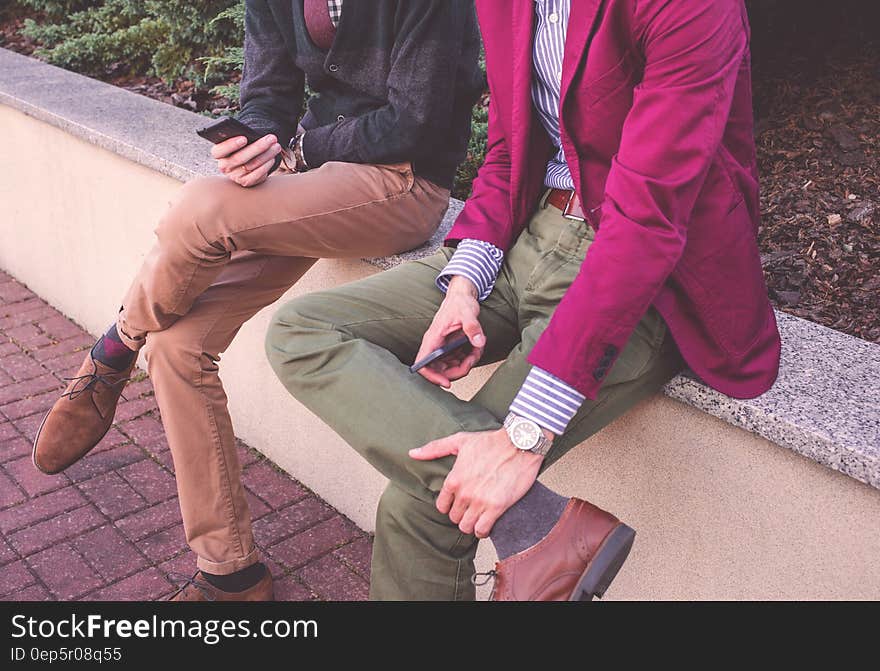 2 Men Wearing Formal Attire Sitting Beside Each Other