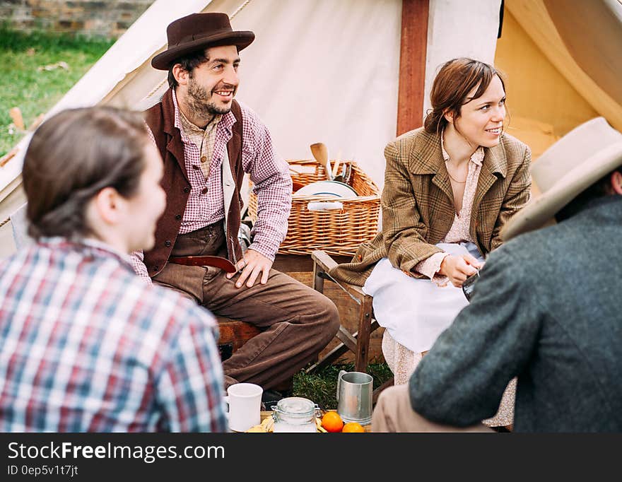 Woman Sitting Beside Man