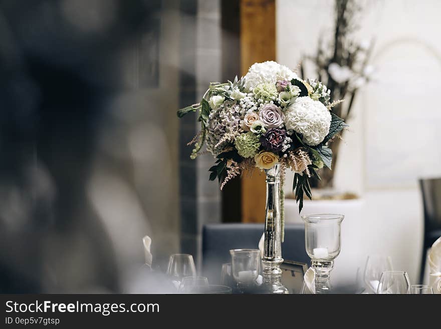 White Flower on Clear Glass Vase