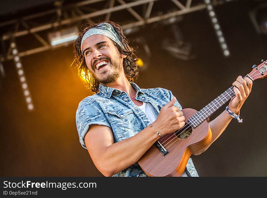 Man Playing Guitar