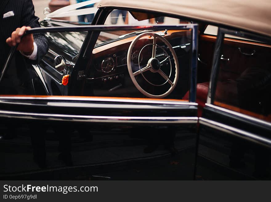 Black Classic Car Inside Well Lighted Room