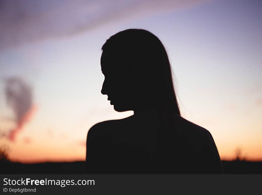 Silhouette of Woman during Sunset