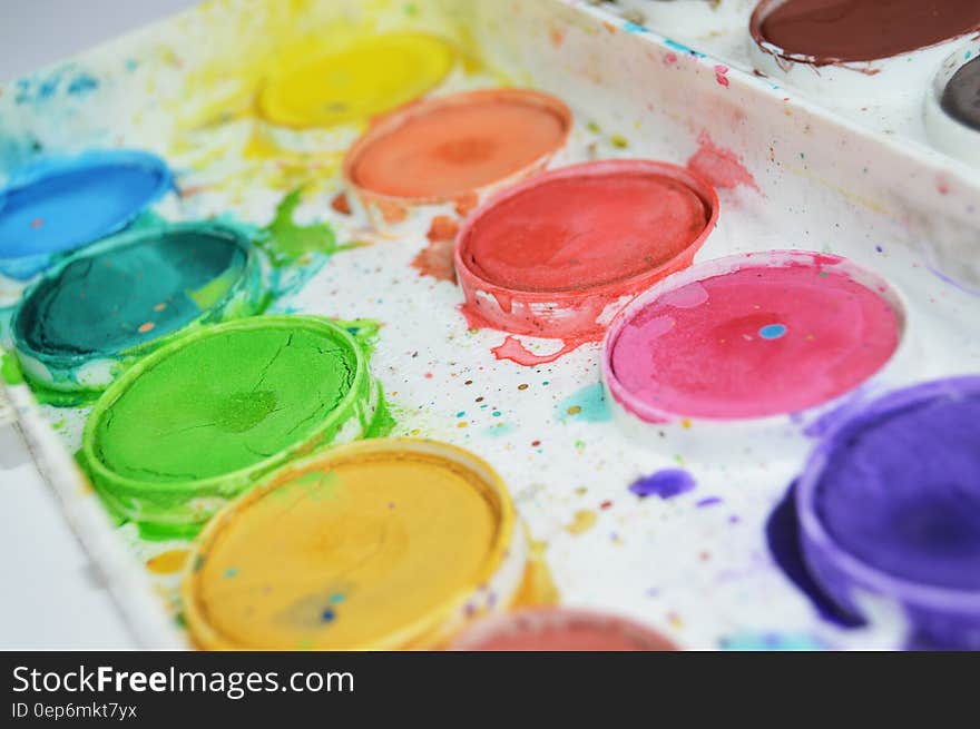 Plastic tray pallet of used watercolor paints, arts concept. Plastic tray pallet of used watercolor paints, arts concept.