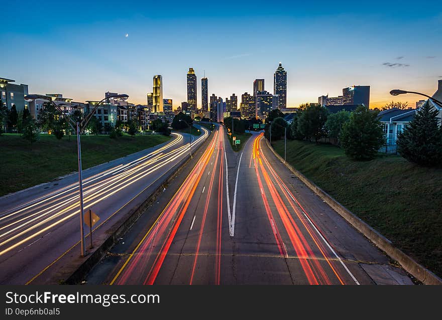 Time Lapse Photography of Road Near Town