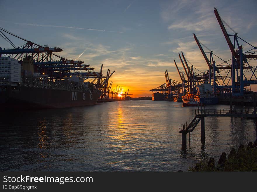 Low Saturated Photo of Oil Rig during Golden Hour