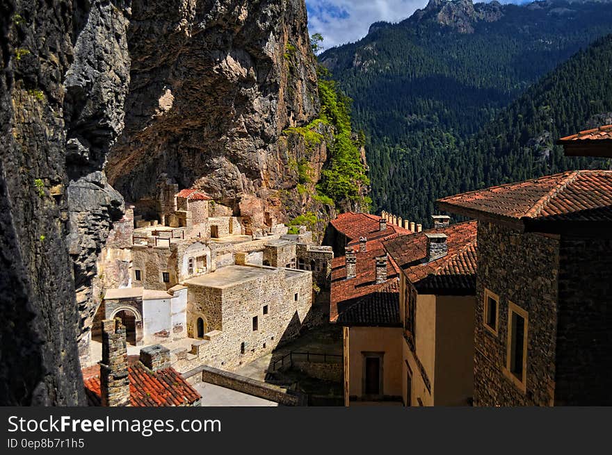 Town on a Gray and Green Mountain Side