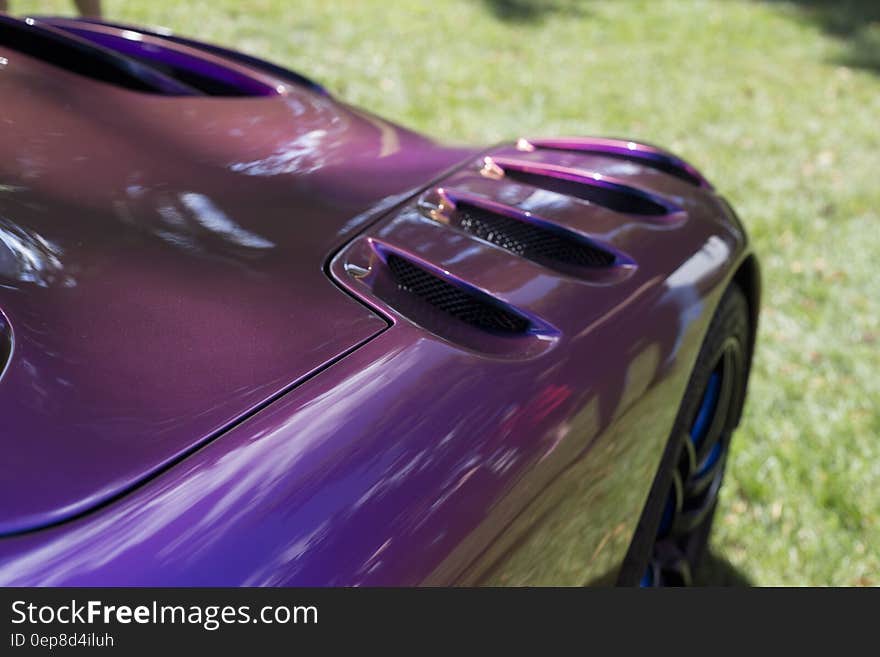 Purple Sport Car during Daytime